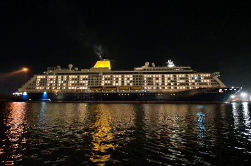 Spirit of Discovery cabins lit up to spell Cakes for Carers
